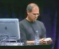 Steve Jobs unsuccessfully fiddling with a digicam