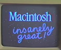 Mac 128k with insanely great written on screen
