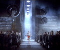 women swaying a hammer in 1984 apple spot