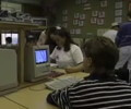 students using compact Macintoshes