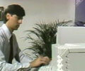 employee using Mac SE and Imagemaker
