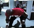 Terry Tate next to tackled office worker
