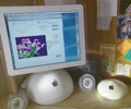 iMac G4 with Airport station next to it