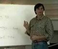 Steve Jobs in front of flipchart
